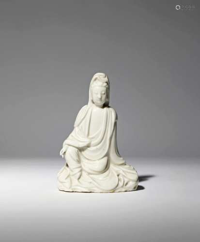 A CHINESE BLANC DE CHINE FIGURE OF GUANYIN 2ND HALF 17TH CENTURY She sits with her right hand