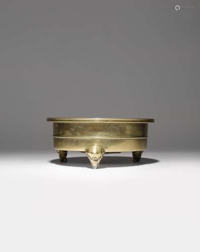 A CHINESE BRONZE TRIPOD INCENSE BURNER QING DYNASTY With raised bands to the cylindrical body and