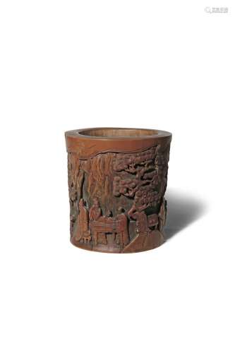 A CHINESE BAMBOO 'SCHOLARS' BRUSHPOT, BITONG 20TH CENTURY The cylindrical body carved in relief with