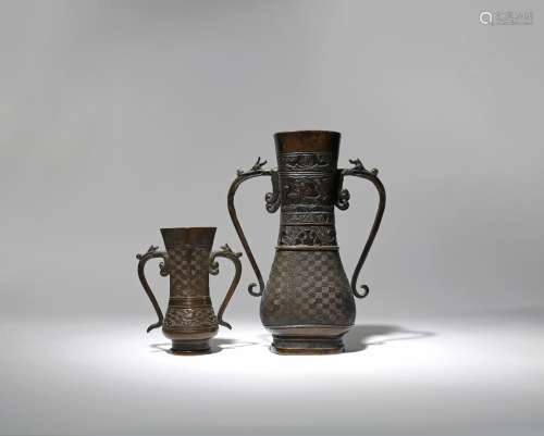 TWO CHINESE BRONZE PEAR-SHAPED VASES MING/QING DYNASTY The larger vase cast with archaistic motifs