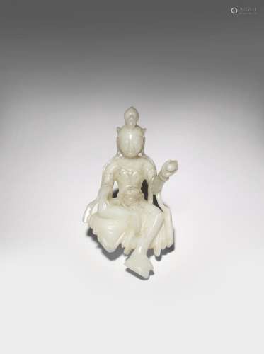A CHINESE WHITE JADE CARVING OF AVALOKITESHVARA 20TH CENTURY The bodhisattva depicted seated in