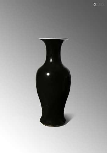 A LARGE CHINESE BLACK GLAZED VASE 18TH/19TH CENTURY The ovoid body with a gently spreading foot