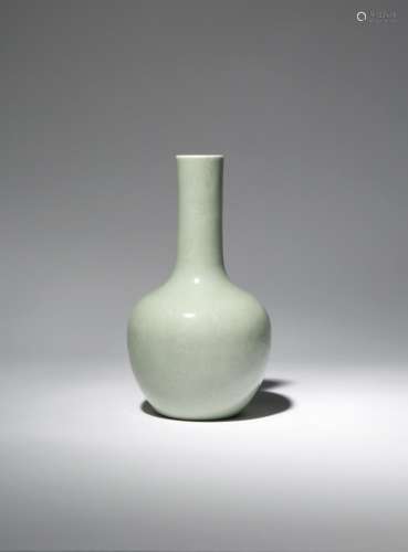 A CHINESE CELADON GLAZED BOTTLE VASE LATE QING DYNASTY The ovoid body and tall cylindrical neck