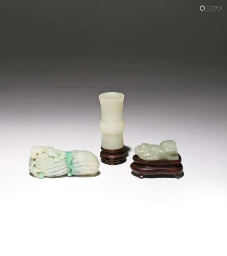 THREE SMALL CHINESE JADE CARVINGS QING DYNASTY One a white jade archaistic gu-shaped vase incised