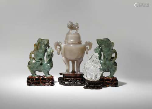 FOUR CHINESE HARDSTONE CARVINGS 19TH CENTURY Comprising: a pair of spinach-green jade vases formed