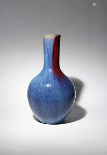 A CHINESE FLAMBE GLAZED BOTTLE VASE 18TH/19TH CENTURY The exterior coated in a crackled pale