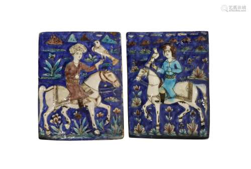 TWO QAJAR POLYCHROME MOULDED TILES 19TH CENTURY Each depicting a falconer riding a horse, with