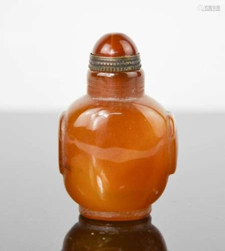 A early 20th century brown agate hand carved snuff bottle with copper spoon and collar