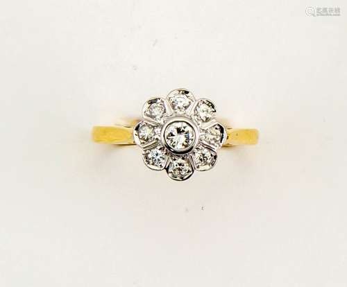 An 18ct yellow gold daisy rubover diamond cluster ring size N, 3.7g.