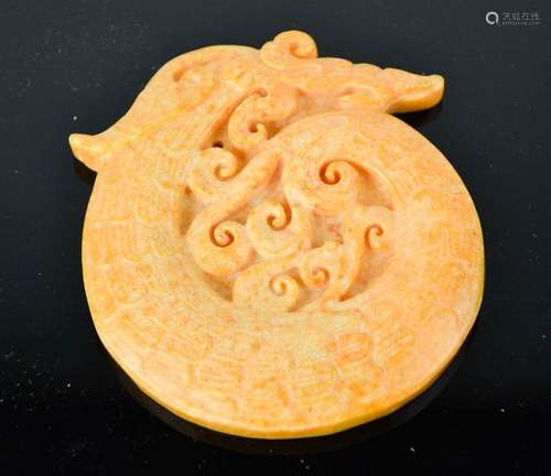 A Chinese natural yellow jade handcarved dragon