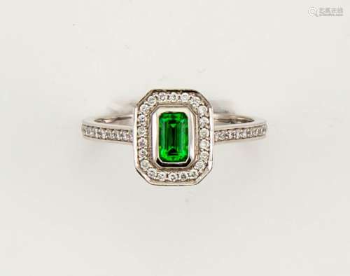 An 18ct white gold tsavorite garnet and diamond Art Deco style ring, size N, 3.9g.