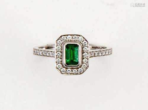 An 18ct white gold, emerald and diamond Art Deco style ring, size N½, 3.7g.