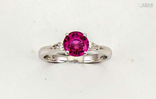 An 18ct white gold, pink sapphire and diamond trilogy ring, the brilliant cut sapphire approx 1ct,