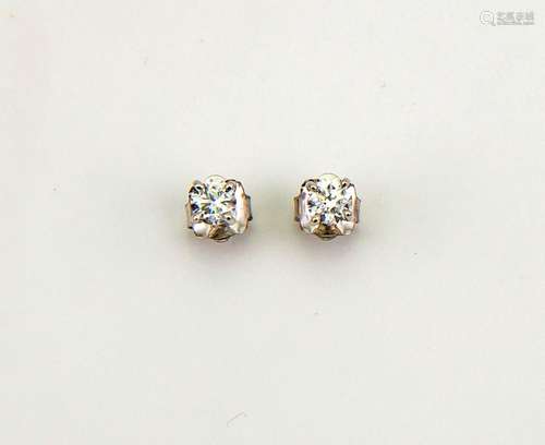 A pair of 18ct white gold and diamond solitaire earrings, 0.80ct each diamond, 1.6g.