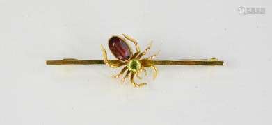 A 9ct gold spider bar brooch, the spider set with coloured faceted stones, 4g.