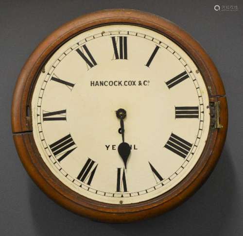 A 19th century wall clock, by Hancock Cox & Co of Yeovil, with Roman numeral dial, 37cm high.
