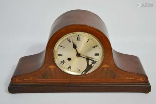 A 1930s mahogany cased mantle clock, inlaid with decoration, 16cm high.