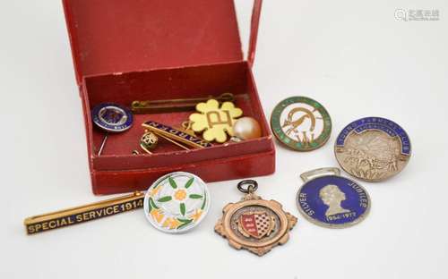 A silver medal dated 1927, together with various enamelled badges; Silver Jubilee, Special