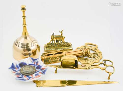 A group of antique and later brassware, including Victorian candle snuffers, nutcracker, a Victorian