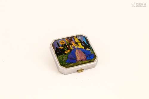 A vintage compact, depicting hand painted and butterfly wing lady amidst flowers.