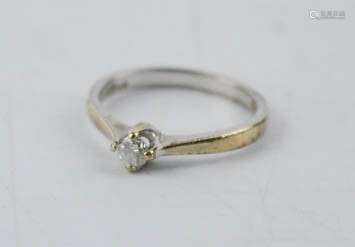 An 18ct white gold and diamond solitaire ring.