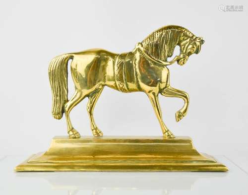 A Victorian brass door stop in the form of a horse,