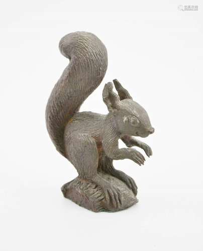 A bronze model squirrel, 10cm high.