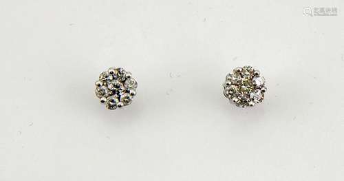 A pair of 18ct white gold diamond cluster earrings, the diamonds totalling approx 1ct.