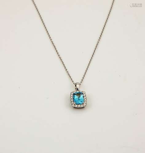 An 18ct white gold, aquamarine and diamond pendant, the radiant cut 0.80ct aquamarine bordered by