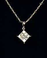 An 18ct white gold nine stone diamond pendant necklace, the princess cut diamonds approx 0.84ct,