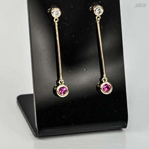 A pair of 9ct yellow gold diamond and ruby drop earrings.