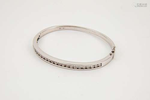 An 18ct white gold and diamond bangle, the brilliant cut diamonds totalling approx 2cts, the