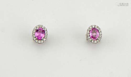 A pair of 18ct white gold, pink sapphire and diamond earrings, approx 0.50ct sapphire each, bordered