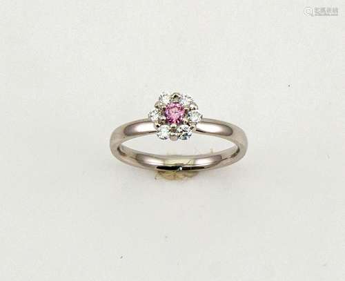 A platinum, pink and white diamond ring, flowerhead form, the pink diamond to the centre 0.12ct, and