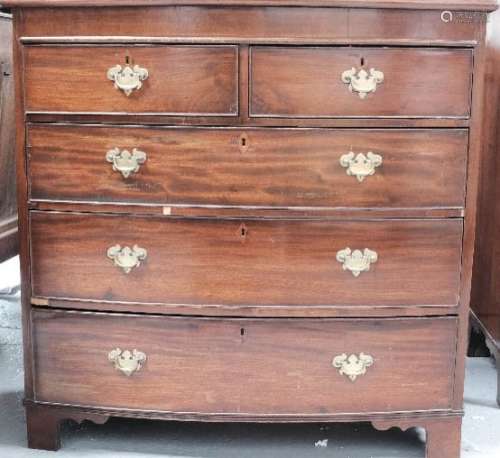 A Victorian bow front chest of drawers, with two over three long graduated drawers, 106 by 44 by