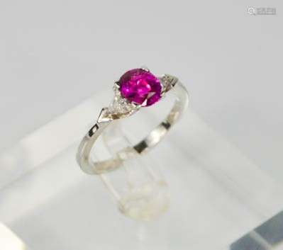 An 18ct white gold and pink sapphire ring, the sapphire approx 1ct, with diamonds totalling 0.20ct.