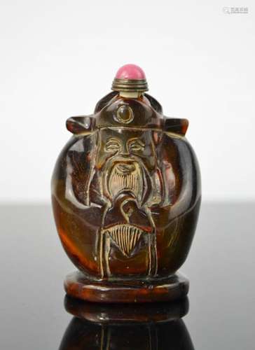 A Chinese handcarved cattle bone figural snuff bottle, with jade stopper and original copper spoon .