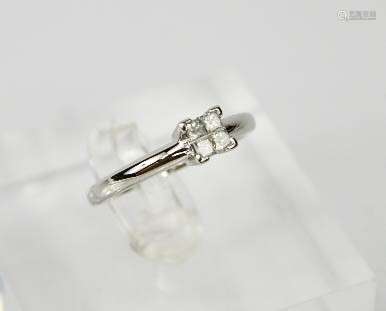 A platinum four stone princess cut diamond ring, 0.20ct total diamonds, size O½, 4.4g.