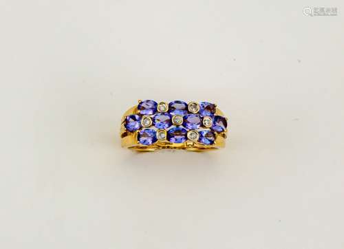 A 14ct gold, tanzanite and diamond ring, size L, 3.5g.