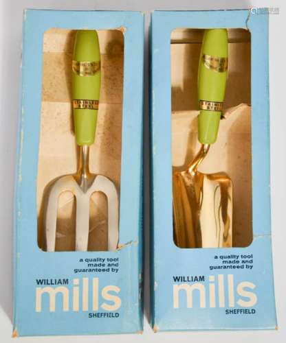 A William Mills of Sheffield gold plated stainless steel weed fork and trowel, with original boxes.