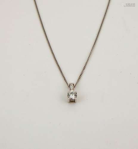 An 18ct white gold and diamond pendant necklace, the brilliant cut diamond approx 0.30cts, and a