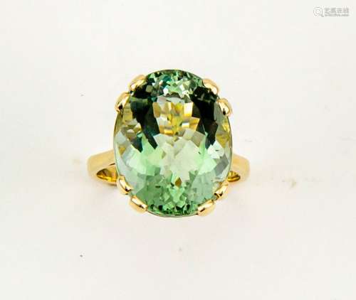 A 9ct yellow gold and green prasiolite solitaire, of oval form approx 14ct, size N, 5.8g.