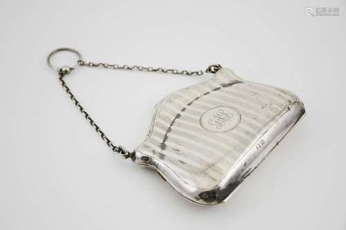 A silver purse, with machine engraved decoration and monogram to the centre, Birmingham 1911,