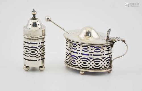 A silver salt with blue glass liner and a matching mustard pot, Birmingham 1927, 1.49toz silver.