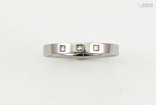 A platinum band, marked 950, set with three princess cut diamonds, size L, 3.2g.