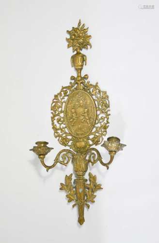 A cast brass wall sconce, with cherubs to the centre, two branches, 63cm high, 27cm wide.