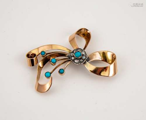 A large yellow metal (tested as 9ct) 1930s diamond and turquoise brooch, in the form of a bow, 6½