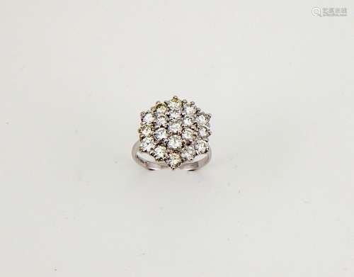 An 18ct white gold and diamond cluster ring, comprising nineteen brilliant cut diamonds, approx 0.