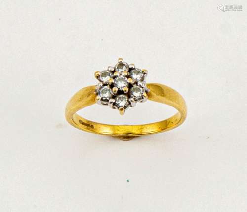 An 18ct gold and diamond cluster / flower head form ring, the diamonds totalling approx 0.50ct, size