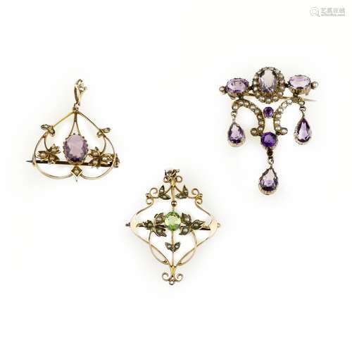 Two gem-set pendant/brooches and another similar brooch, circa 1890